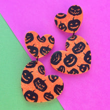 Load image into Gallery viewer, Orange and black pumpkin print heart polymer clay stud earrings
